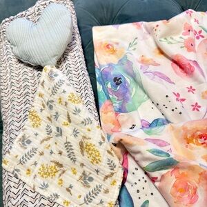 Bundle of baby swaddling and receiving blankets